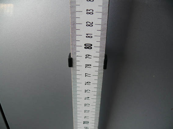 Geometric ruler bracket with suction pad base